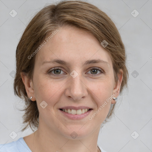 Joyful white adult female with medium  brown hair and grey eyes