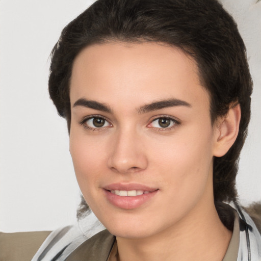 Joyful white young-adult female with medium  brown hair and brown eyes