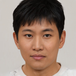 Neutral asian young-adult male with short  brown hair and brown eyes