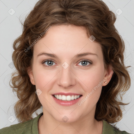 Joyful white young-adult female with medium  brown hair and green eyes