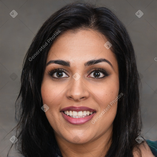 Joyful latino young-adult female with long  brown hair and brown eyes