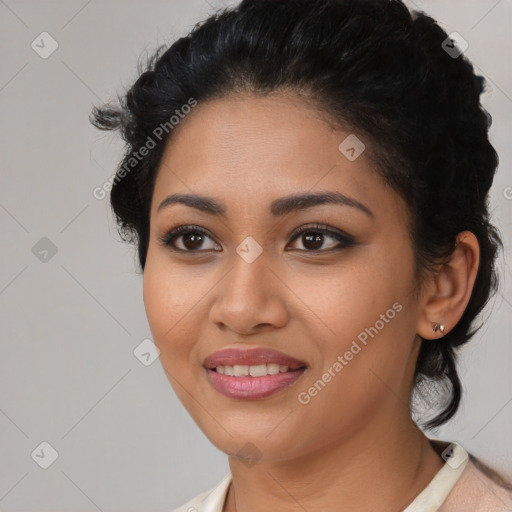 Joyful latino young-adult female with medium  black hair and brown eyes