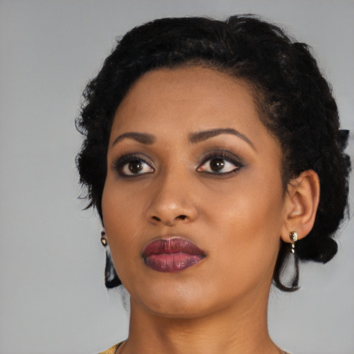 Neutral black young-adult female with medium  black hair and brown eyes