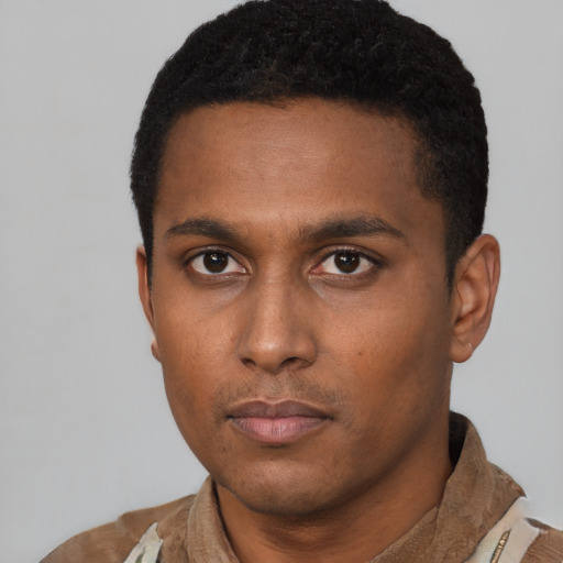 Neutral latino young-adult male with short  black hair and brown eyes