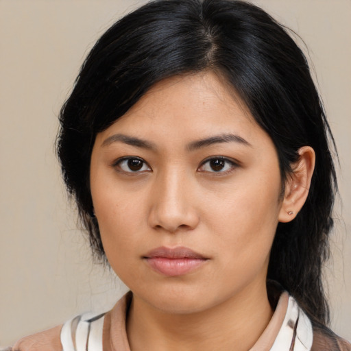 Neutral asian young-adult female with medium  brown hair and brown eyes
