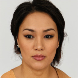 Neutral asian young-adult female with long  brown hair and brown eyes