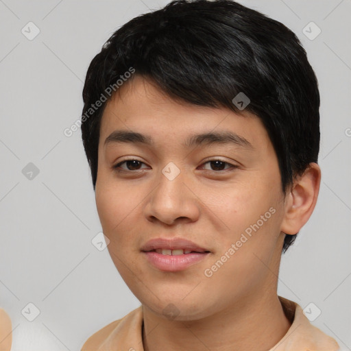 Joyful asian young-adult male with short  black hair and brown eyes
