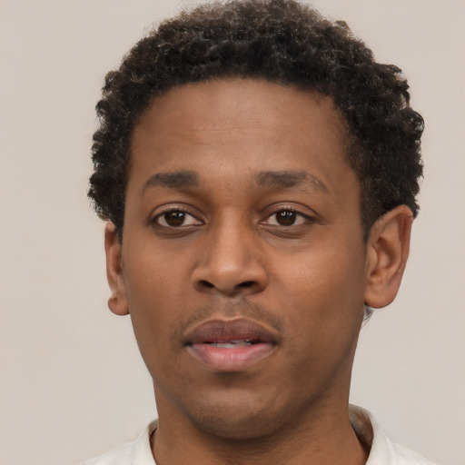 Neutral black young-adult male with short  brown hair and brown eyes