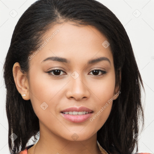 Joyful latino young-adult female with long  brown hair and brown eyes