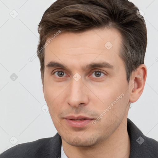 Neutral white young-adult male with short  brown hair and brown eyes