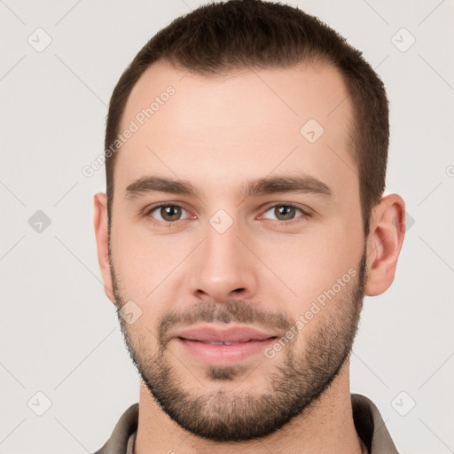 Neutral white young-adult male with short  brown hair and brown eyes