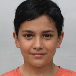 Joyful white child female with short  brown hair and brown eyes