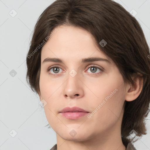 Neutral white young-adult female with medium  brown hair and grey eyes