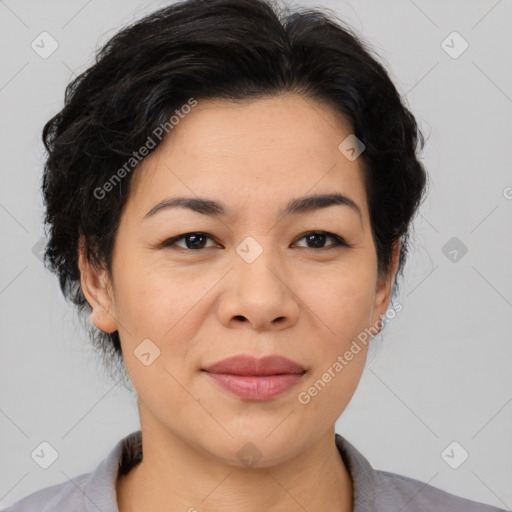 Joyful asian adult female with medium  brown hair and brown eyes