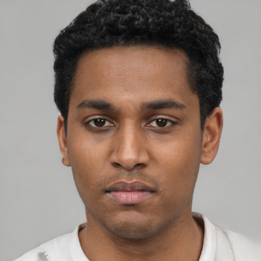 Neutral black young-adult male with short  black hair and brown eyes