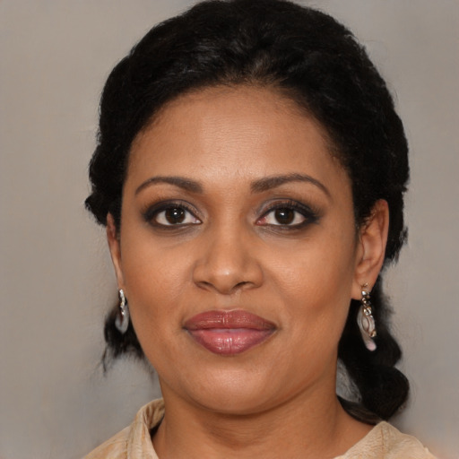 Joyful black young-adult female with medium  black hair and brown eyes