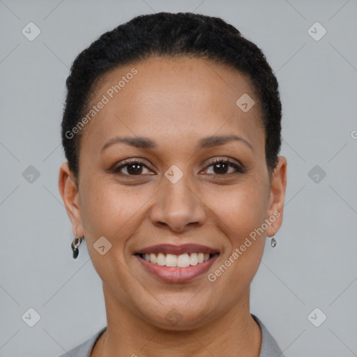 Joyful black young-adult female with short  brown hair and brown eyes