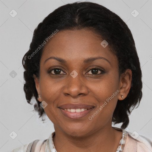 Joyful black young-adult female with medium  brown hair and brown eyes