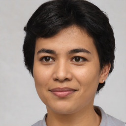 Joyful asian young-adult female with short  black hair and brown eyes