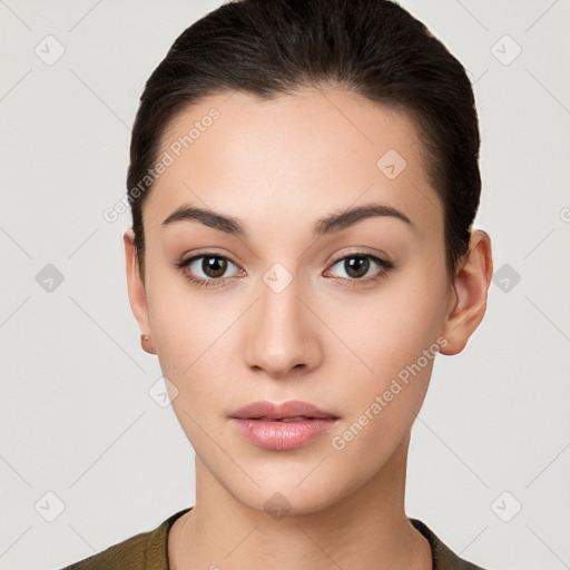 Neutral white young-adult female with short  brown hair and brown eyes