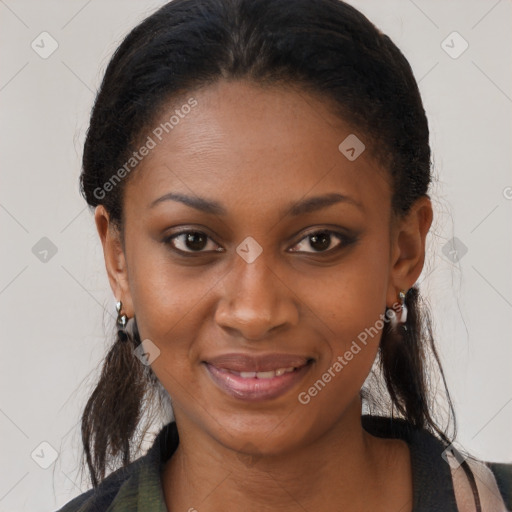 Joyful black young-adult female with long  brown hair and brown eyes