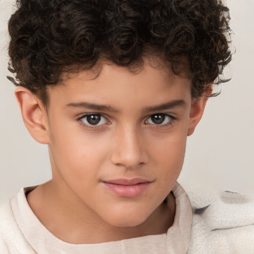 Joyful white child male with short  brown hair and brown eyes