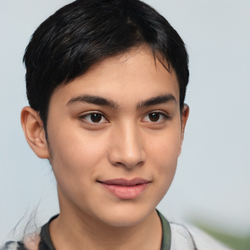 Joyful latino young-adult male with short  brown hair and brown eyes