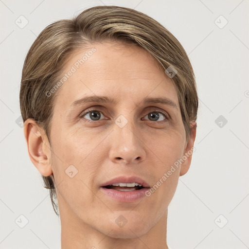 Joyful white adult female with short  brown hair and grey eyes