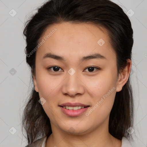 Joyful white young-adult female with medium  brown hair and brown eyes