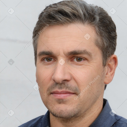 Neutral white adult male with short  brown hair and brown eyes