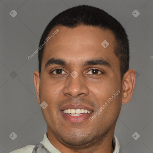 Joyful black young-adult male with short  black hair and brown eyes