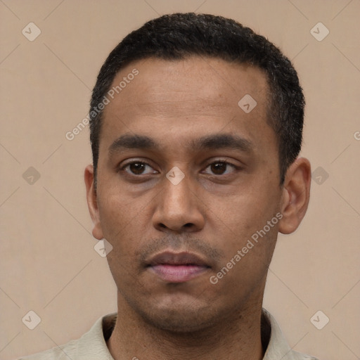 Neutral latino young-adult male with short  black hair and brown eyes