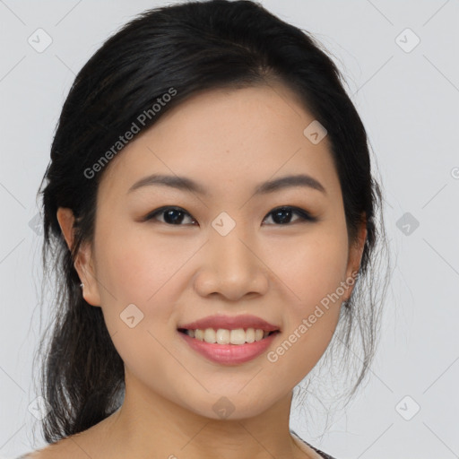 Joyful asian young-adult female with medium  black hair and brown eyes