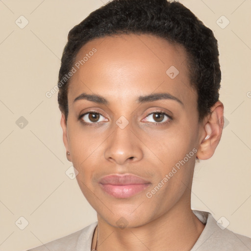 Joyful latino young-adult female with short  black hair and brown eyes