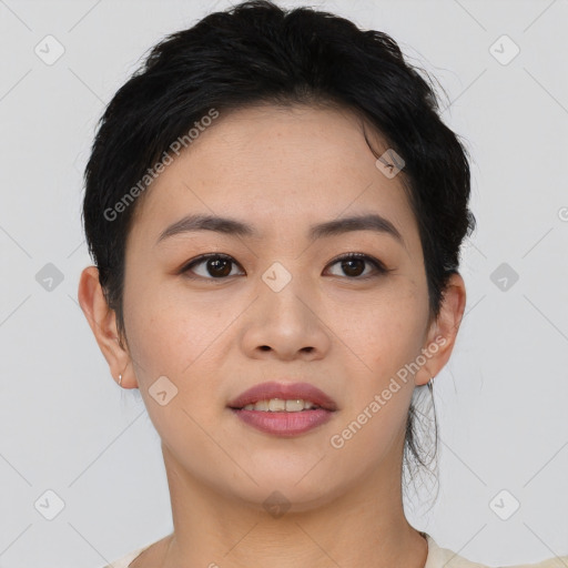 Joyful asian young-adult female with short  brown hair and brown eyes