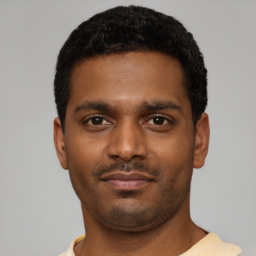 Neutral black young-adult male with short  black hair and brown eyes
