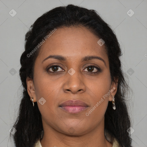 Joyful black young-adult female with long  brown hair and brown eyes