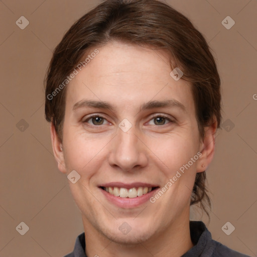 Joyful white adult female with short  brown hair and brown eyes