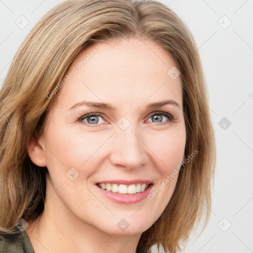 Joyful white young-adult female with medium  brown hair and blue eyes