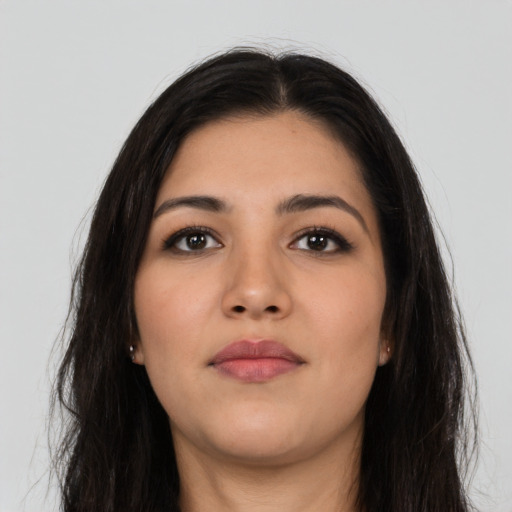 Neutral latino young-adult female with long  black hair and brown eyes