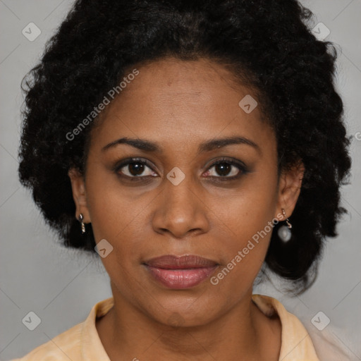 Joyful black young-adult female with medium  brown hair and brown eyes