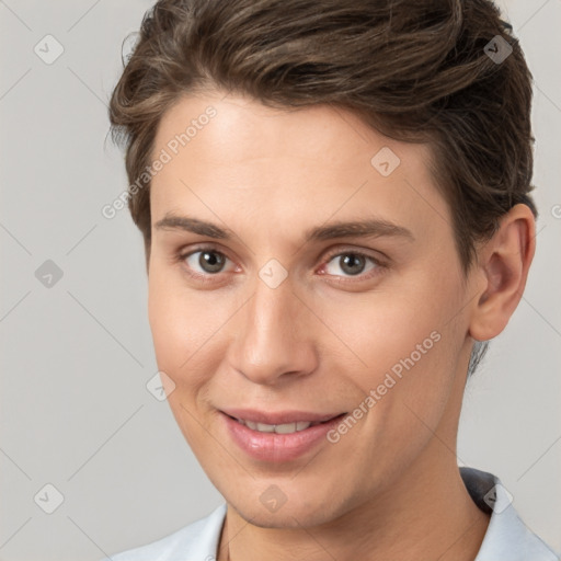 Joyful white young-adult female with short  brown hair and brown eyes