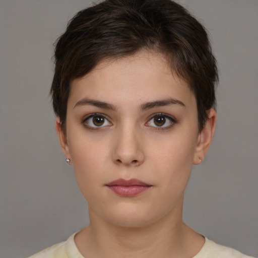 Neutral white young-adult female with short  brown hair and brown eyes