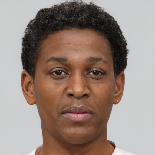 Neutral black adult male with short  brown hair and brown eyes