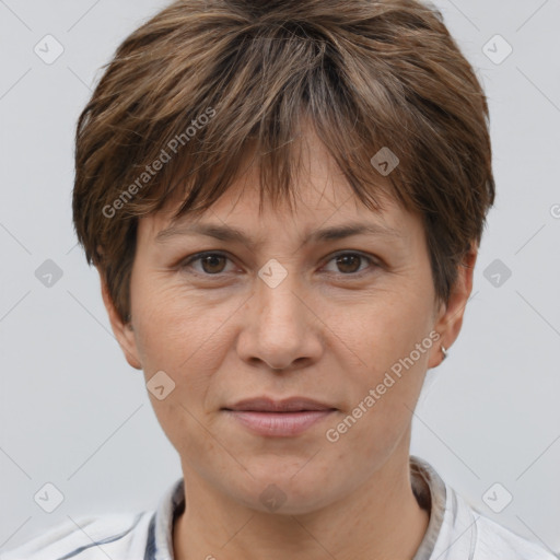 Joyful white adult female with short  brown hair and brown eyes