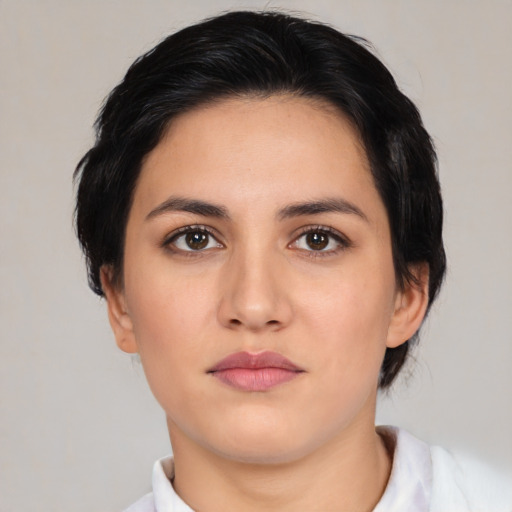 Neutral white young-adult female with medium  brown hair and brown eyes