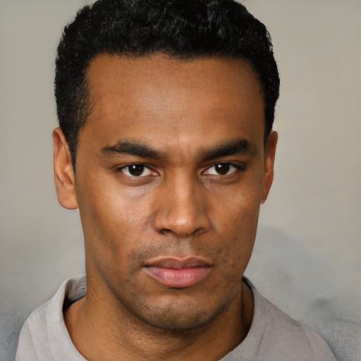 Neutral black young-adult male with short  black hair and brown eyes