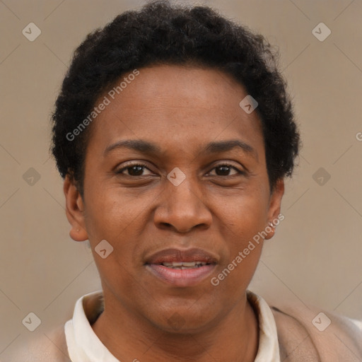 Joyful black adult female with short  brown hair and brown eyes