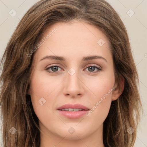 Joyful white young-adult female with long  brown hair and green eyes