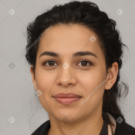 Joyful latino young-adult female with medium  brown hair and brown eyes